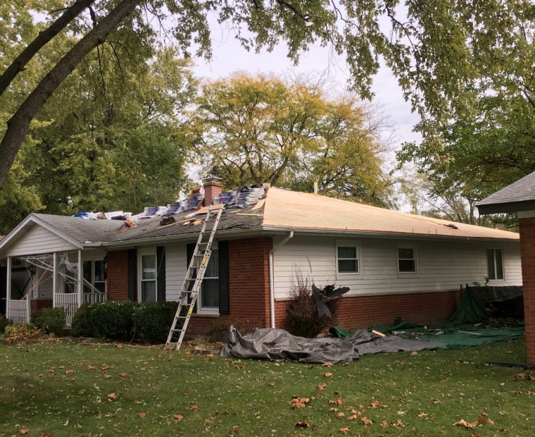 Suburban Elk Grove home during roof installation